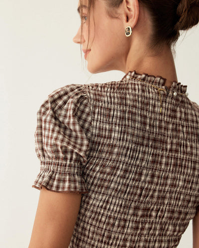 Canela | Vestido mini con mangas abullonadas y estampado de cuadros cafés