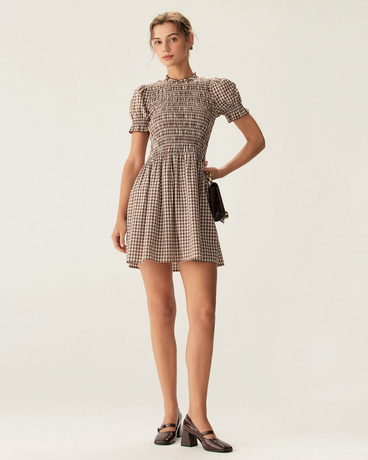 Canela | Vestido mini con mangas abullonadas y estampado de cuadros cafés